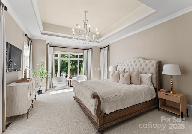 carpeted bedroom with an inviting chandelier, a raised ceiling, and crown molding