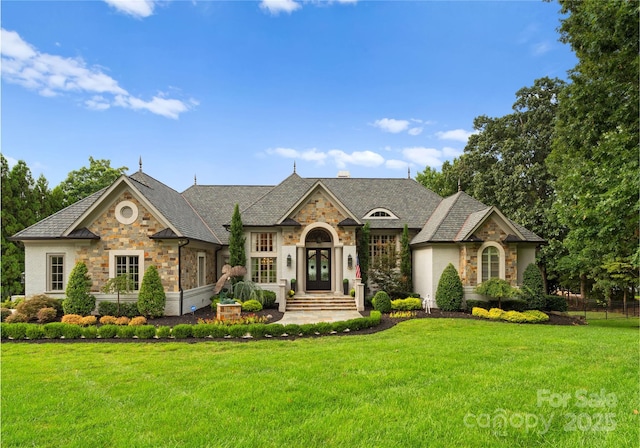 view of front of house with a front lawn