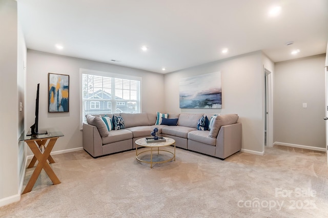 living room featuring light colored carpet