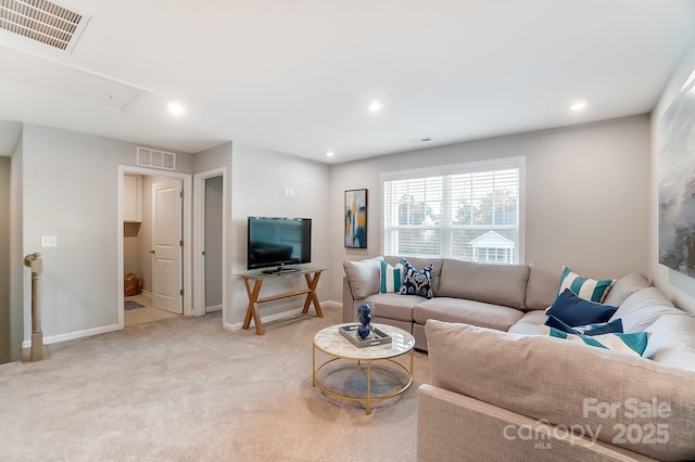 living room featuring light carpet