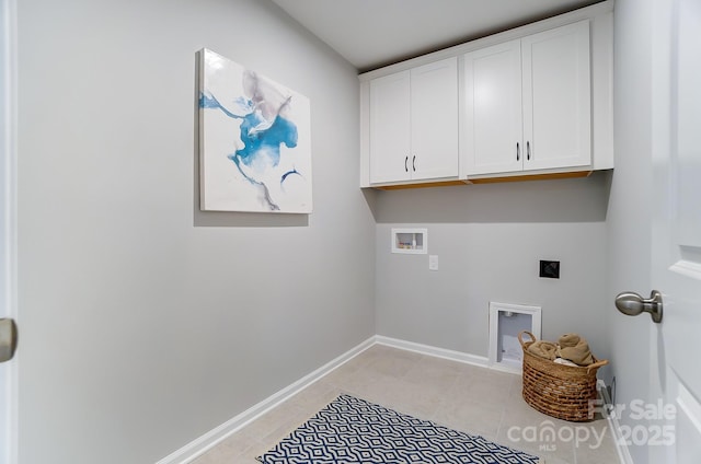 laundry room with cabinets, electric dryer hookup, and hookup for a washing machine