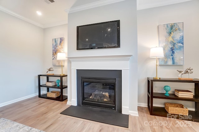 room details with crown molding and hardwood / wood-style flooring