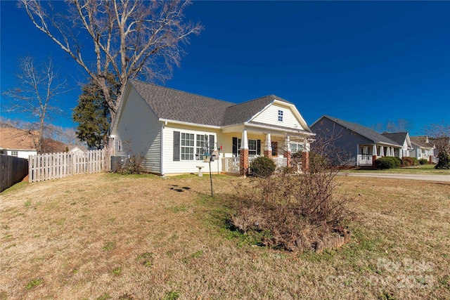 view of front facade featuring a porch and a front yard