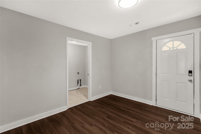 foyer with hardwood / wood-style flooring