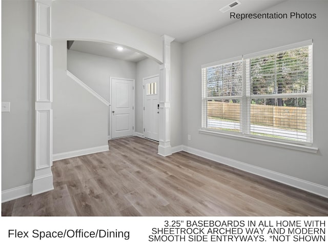 entrance foyer with light hardwood / wood-style flooring