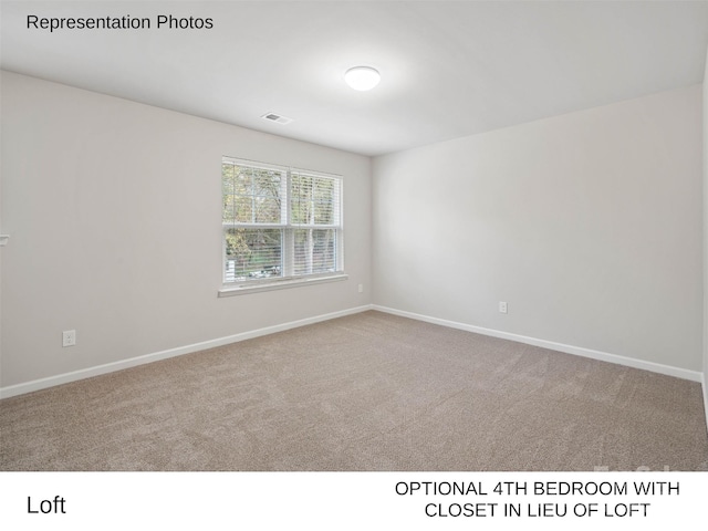 view of carpeted spare room