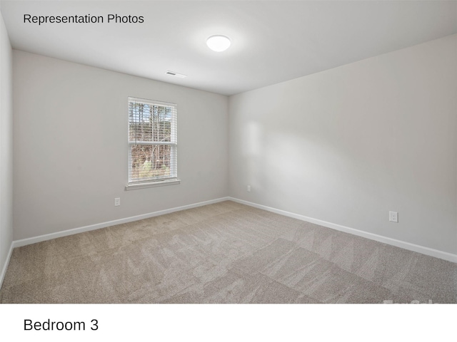 view of carpeted empty room