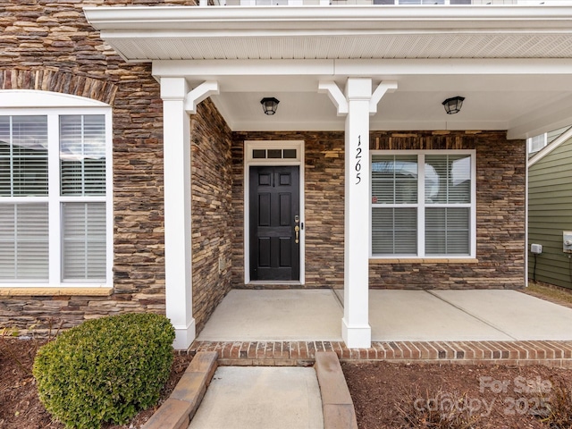 property entrance with a porch