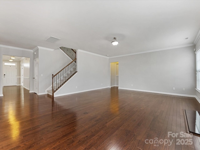 unfurnished living room with dark hardwood / wood-style floors and ornamental molding