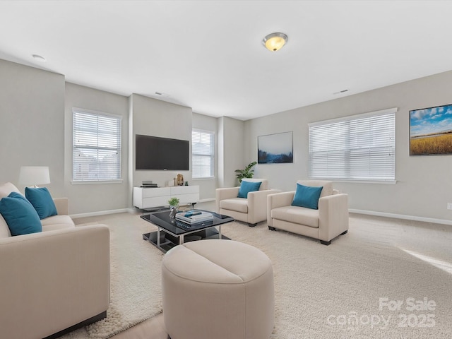 living room featuring light colored carpet