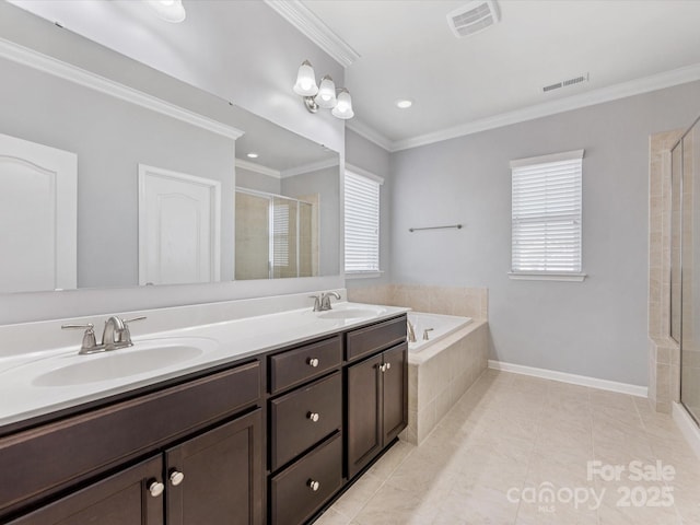 bathroom with tile patterned flooring, vanity, ornamental molding, and independent shower and bath