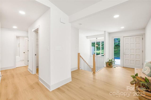 entryway with light hardwood / wood-style floors