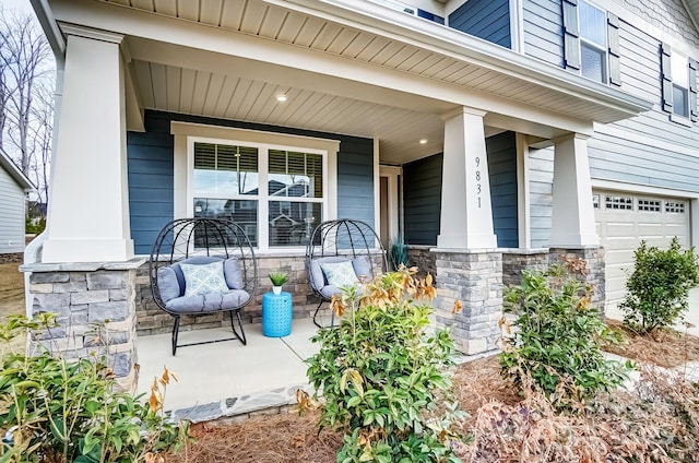 doorway to property with stone siding and a porch