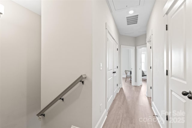 hallway featuring light wood-type flooring