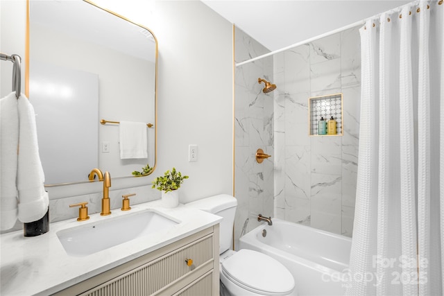 full bathroom featuring vanity, shower / tub combo, and toilet