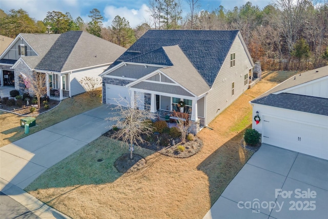 exterior space featuring a front yard and a garage