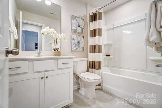 full bathroom with vanity, toilet, and shower / bath combo with shower curtain