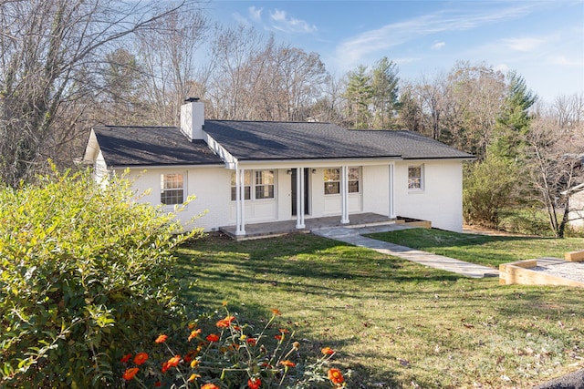 view of front of house featuring a front lawn and a porch