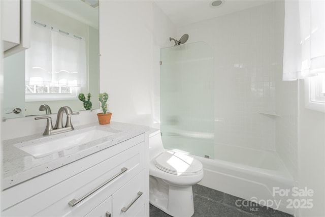 full bathroom featuring vanity, toilet, and shower / bathing tub combination