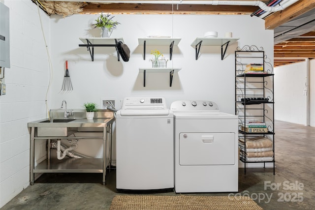 clothes washing area with independent washer and dryer