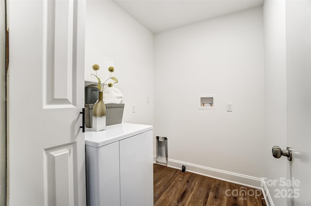 laundry area with dark hardwood / wood-style floors and washer / clothes dryer