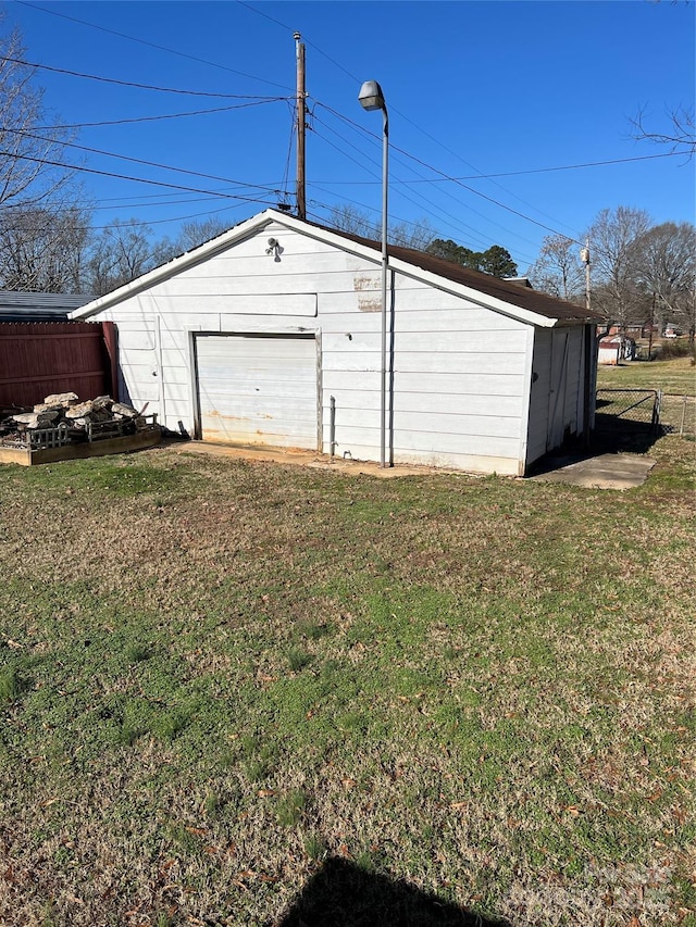 garage with a yard