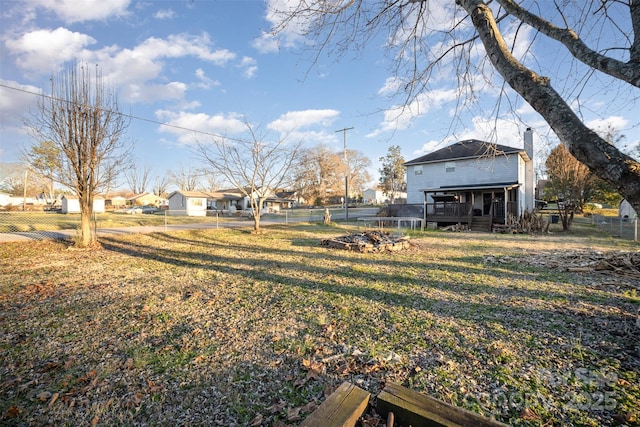 view of yard with a wooden deck