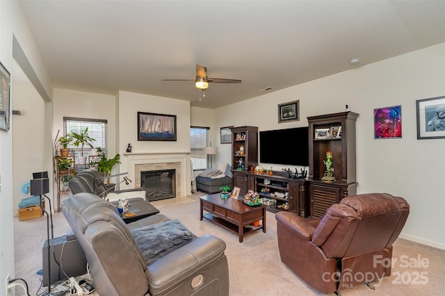 living room featuring ceiling fan and light carpet