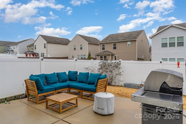 view of patio featuring outdoor lounge area and a grill