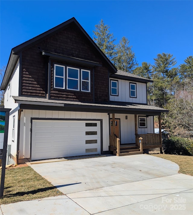 view of front of house with a garage, covered porch, board and batten siding, and driveway