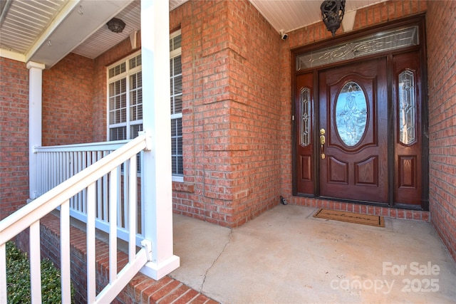 property entrance with a porch