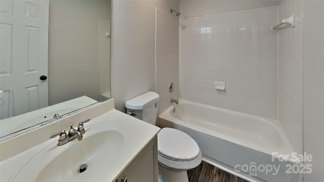 full bathroom featuring shower / washtub combination, vanity, and toilet