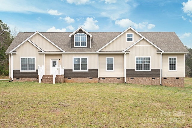 view of front of home with a front yard