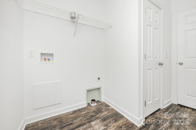 clothes washing area featuring hookup for an electric dryer, dark wood-type flooring, and hookup for a washing machine