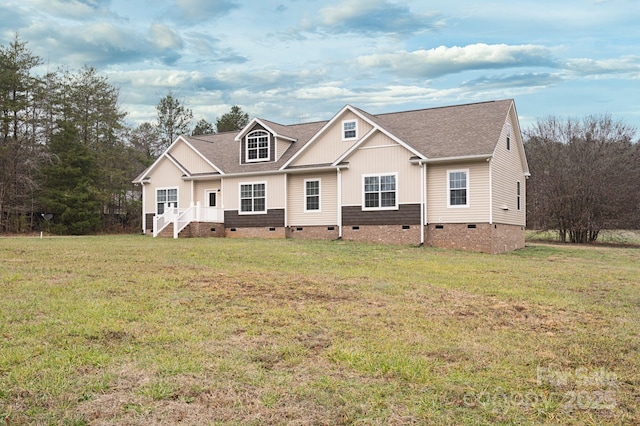 view of front of property with a front lawn