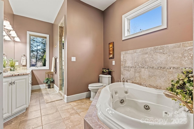 full bathroom featuring tile patterned flooring, vanity, separate shower and tub, and toilet