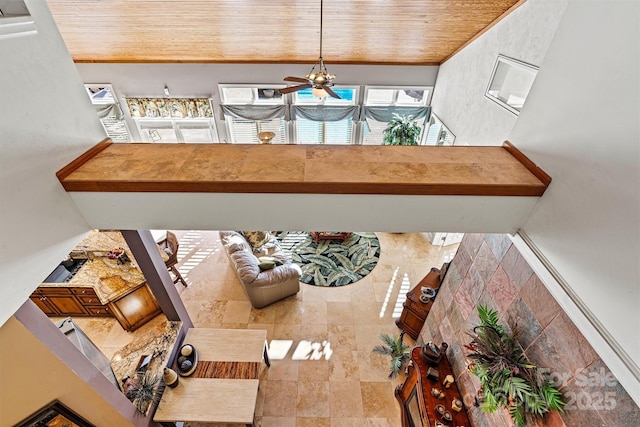 interior space featuring wooden ceiling and an inviting chandelier