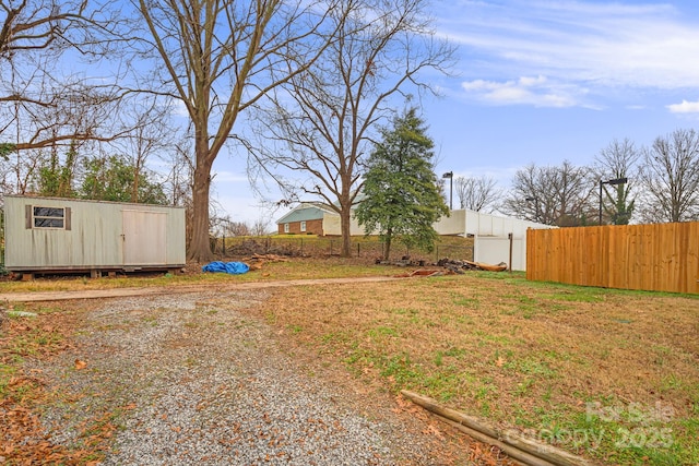 view of yard with a shed