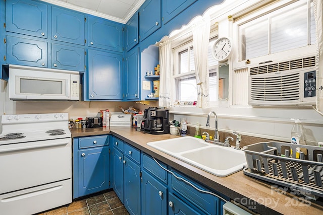 kitchen with white appliances, blue cabinets, crown molding, and sink