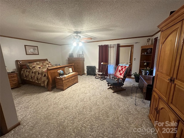 bedroom with carpet flooring, ceiling fan, and crown molding