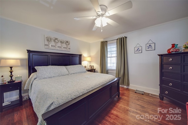 bedroom featuring dark hardwood / wood-style flooring and ceiling fan