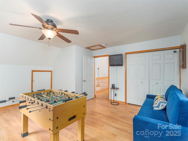 1185 Mule Stomp Rd, Clyde, NC 28721 - game room with light wood-type flooring, ceiling fan, and attic access