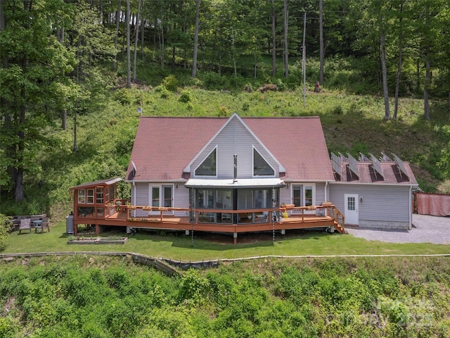 1185 Mule Stomp Rd, Clyde, NC 28721 - rear view of property with a wooden deck, a lawn, and a view of trees