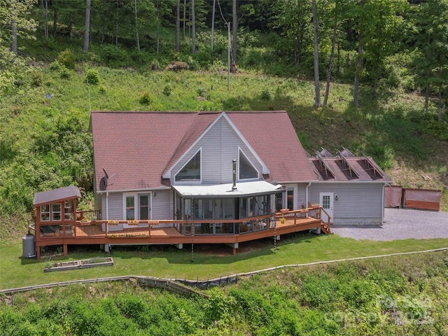 1185 Mule Stomp Rd, Clyde, NC 28721 - back of house with a deck, a yard, and a wooded view