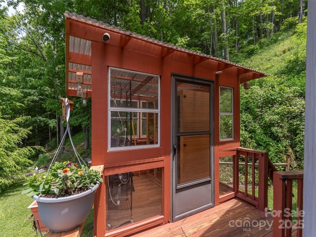 1185 Mule Stomp Rd, Clyde, NC 28721 - view of outbuilding featuring a wooded view