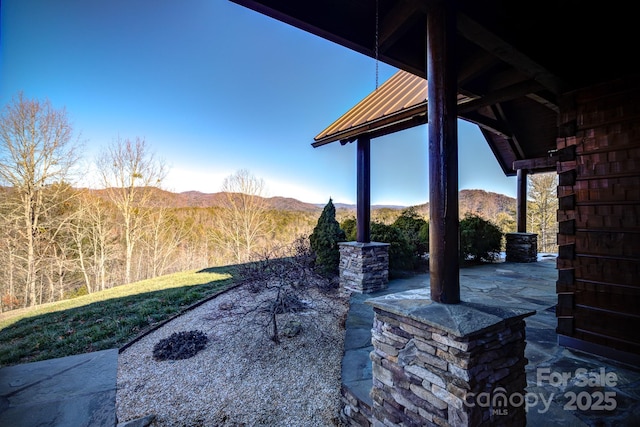 view of patio with a mountain view