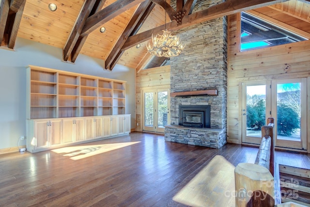 unfurnished living room with high vaulted ceiling, wooden ceiling, a notable chandelier, and dark wood-type flooring