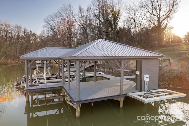 view of dock with a water view