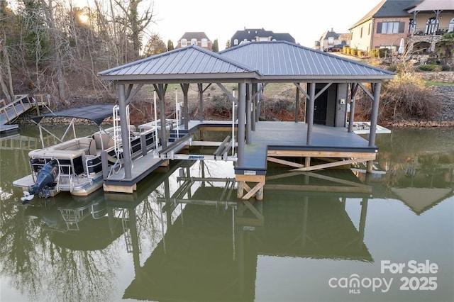 dock area featuring a water view