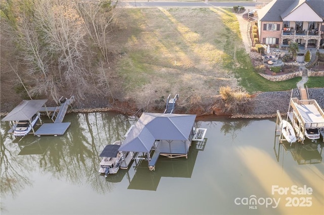 view of dock featuring a yard and a water view